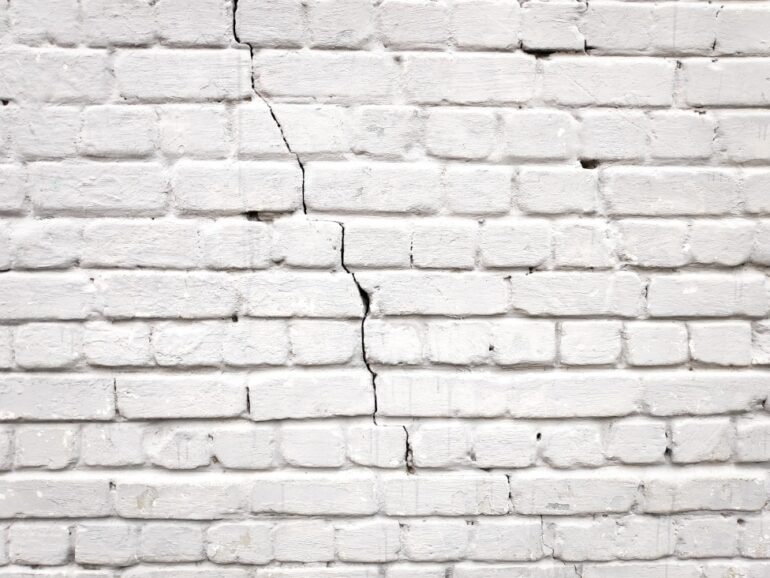 a cracked brick wall due to foundation problems