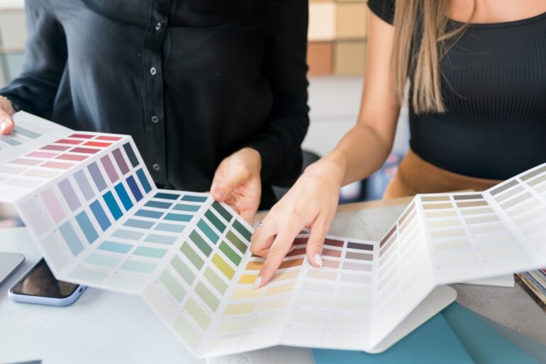 a homeowner and interior designer selecting paint colors