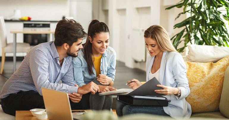 realtor discussing commissions and fees with clients